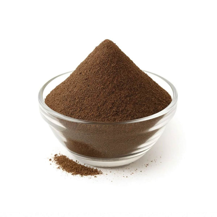 Australian Golden Blend wattleseed powder in a clear glass bowl
